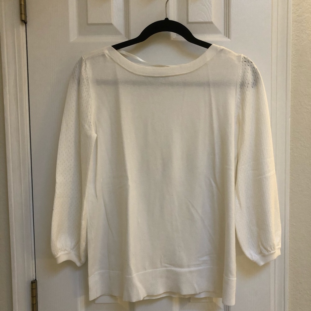 White sweater with sleeve detail